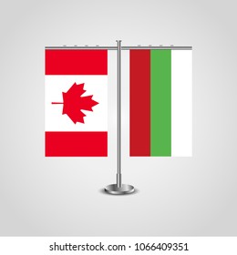 Table stand with flags of Canada and Bulgaria.Two flag. Flag pole. Symbolizing the cooperation between the two countries. Table flags