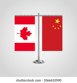 Table stand with flags of Canada and China.Two flag. Flag pole. Symbolizing the cooperation between the two countries. Table flags
