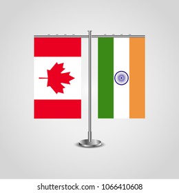 Table stand with flags of Canada and India.Two flag. Flag pole. Symbolizing the cooperation between the two countries. Table flags