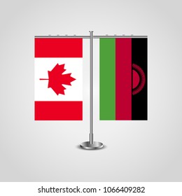 Table stand with flags of Canada and Malawi.Two flag. Flag pole. Symbolizing the cooperation between the two countries. Table flags