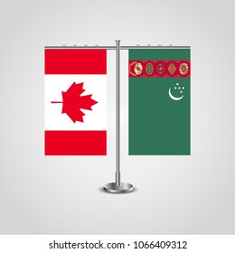 Table stand with flags of Canada and Turkmenistan.Two flag. Flag pole. Symbolizing the cooperation between the two countries. Table flags