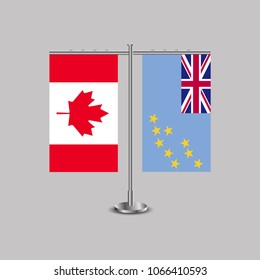 Table stand with flags of Canada and Tuvalu.Two flag. Flag pole. Symbolizing the cooperation between the two countries. Table flags