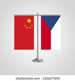 Table stand with flags of China and Czech Republic.Two flag. Flag pole. Symbolizing the cooperation between the two countries. Table flags