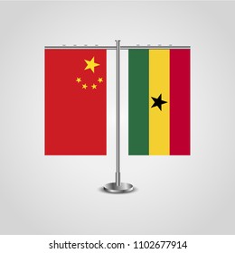 Table stand with flags of China and Ghana.Two flag. Flag pole. Symbolizing the cooperation between the two countries. Table flags