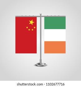 Table stand with flags of China and Ireland.Two flag. Flag pole. Symbolizing the cooperation between the two countries. Table flags