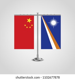 Table stand with flags of China and Marshall Islands.Two flags. Flag pole. Symbolizing the cooperation between the two countries. Table flags