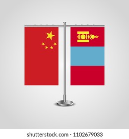 Table stand with flags of China and Mongolia.Two flag. Flag pole. Symbolizing the cooperation between the two countries. Table flags