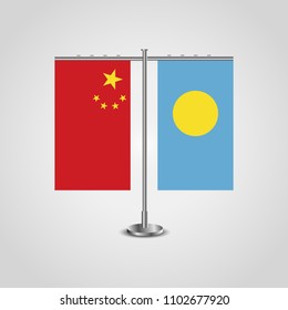 Table stand with flags of China and Palau.Two flag. Flag pole. Symbolizing the cooperation between the two countries. Table flags