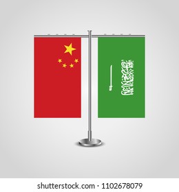 Table stand with flags of China and Saudi Arabia.Two flag. Flag pole. Symbolizing the cooperation between the two countries. Table flags