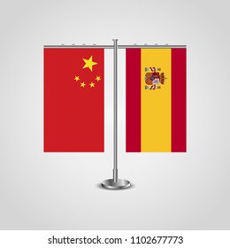 Table stand with flags of China and Spain.Two flag. Flag pole. Symbolizing the cooperation between the two countries. Table flags