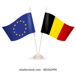Table stand with flags of EU and Belgia. Symbolizing the cooperation between the two countries. flag icons. Two flag vector. flag pole. 