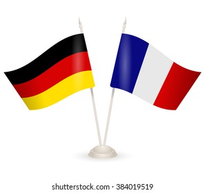 Table stand with flags of Germany and France. Symbolizing the cooperation between the two countries. flag icons. Two flag vector. flag pole. 