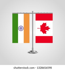 Table stand with flags of India and Canada.Two flag. Flag pole. Symbolizing the cooperation between the two countries. Table flags