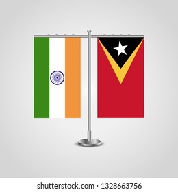 Table stand with flags of India and East Timor.Two flag. Flag pole. Symbolizing the cooperation between the two countries. Table flags