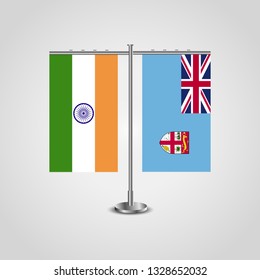 Table stand with flags of India and Fiji.Two flag. Flag pole. Symbolizing the cooperation between the two countries. Table flags