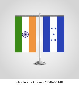 Table stand with flags of India and Honduras.Two flag. Flag pole. Symbolizing the cooperation between the two countries. Table flags