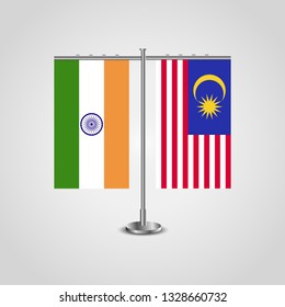 Table stand with flags of India and Malaysia.Two flag. Flag pole. Symbolizing the cooperation between the two countries. Table flags