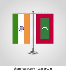 Table stand with flags of India and Maldives.Two flag. Flag pole. Symbolizing the cooperation between the two countries. Table flags