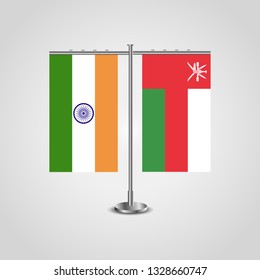 Table stand with flags of India and Oman.Two flag. Flag pole. Symbolizing the cooperation between the two countries. Table flags
