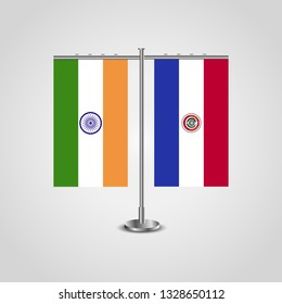 Table stand with flags of India and Paraguay. Two flag. Flag pole. Symbolizing the cooperation between the two countries. Table flags