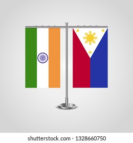 Table stand with flags of India and Philippines.Two flag. Flag pole. Symbolizing the cooperation between the two countries. Table flags