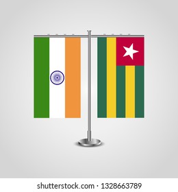 Table stand with flags of India and Togo.Two flag. Flag pole. Symbolizing the cooperation between the two countries. Table flags