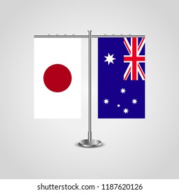 Table stand with flags of Japan and Australia.Two flag. Flag pole. Symbolizing the cooperation between the two countries. Table flags