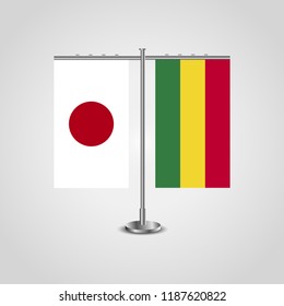 Table stand with flags of Japan and Bolivia.Two flag. Flag pole. Symbolizing the cooperation between the two countries. Table flags