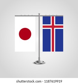 Table stand with flags of Japan and Iceland.Two flag. Flag pole. Symbolizing the cooperation between the two countries. Table flags