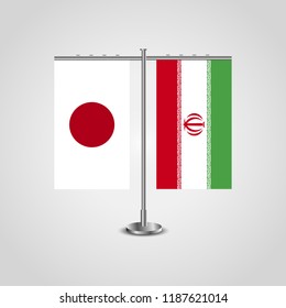Table stand with flags of Japan and Iran.Two flag. Flag pole. Symbolizing the cooperation between the two countries. Table flags