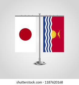 Table stand with flags of Japan and Kiribati.Two flag. Flag pole. Symbolizing the cooperation between the two countries. Table flags