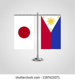Table stand with flags of Japan and Philippines.Two flag. Flag pole. Symbolizing the cooperation between the two countries. Table flags