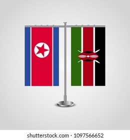 Table stand with flags of North Korea and Kenya.Two flag. Flag pole. Symbolizing the cooperation between the two countries. Table flags