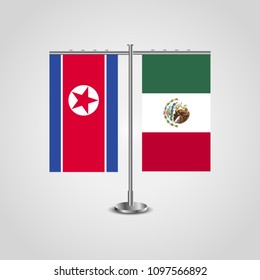 Table stand with flags of North Korea and Mexico.Two flag. Flag pole. Symbolizing the cooperation between the two countries. Table flags