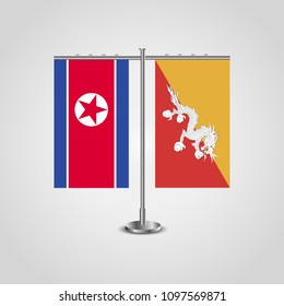 Table stand with flags of North Korea and Butane.Two flag. Flag pole. Symbolizing the cooperation between the two countries. Table flags