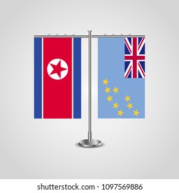 Table stand with flags of North Korea and Tuvalu.Two flag. Flag pole. Symbolizing the cooperation between the two countries. Table flags