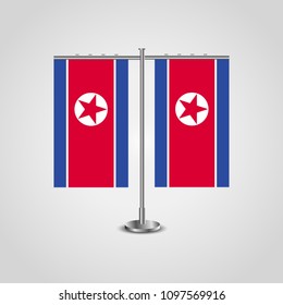 Table stand with flags of North Korea and North Korea.Two flag. Flag pole. Symbolizing the cooperation between the two countries. Table flags
