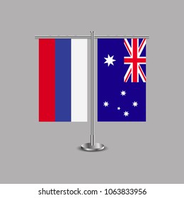 Table stand with flags of Russia and Australia.Two flag. Flag pole. Symbolizing the cooperation between the two countries.Table flags