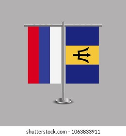Table stand with flags of Russia and Barbados.Two flag. Flag pole. Symbolizing the cooperation between the two countries.Table flags