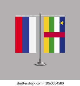 Table stand with flags of Russia and Central African Republic.Two flag. Flag pole. Symbolizing the cooperation between the two countries.Table flags
