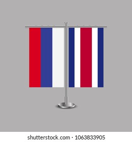 Table stand with flags of Russia and Costa Rica.Two flag. Flag pole. Symbolizing the cooperation between the two countries.Table flags