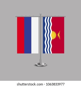 Table stand with flags of Russia and Kiribati.Two flag. Flag pole. Symbolizing the cooperation between the two countries.Table flags