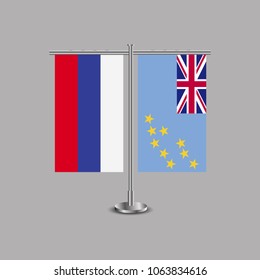 Table stand with flags of Russia and Tuvalu.Two flag. Flag pole. Symbolizing the cooperation between the two countries.Table flags