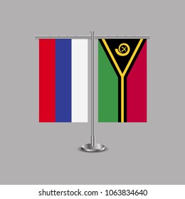 Table stand with flags of Russia and Vanuatu.Two flag. Flag pole. Symbolizing the cooperation between the two countries.Table flags