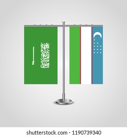 Table stand with flags of Saudi Arabia and Uzbekistan.Two flag. Flag pole. Symbolizing the cooperation between the two countries. Table flags