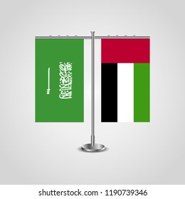 Table stand with flags of Saudi Arabia and United Arab Emirates.Two flag. Flag pole. Symbolizing the cooperation between the two countries. Table flags