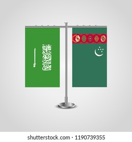 Table stand with flags of Saudi Arabia and Turkmenistan.Two flag. Flag pole. Symbolizing the cooperation between the two countries. Table flags