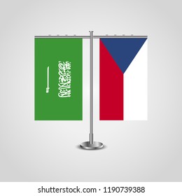 Table stand with flags of Saudi Arabia and Czech Republic.Two flag. Flag pole. Symbolizing the cooperation between the two countries. Table flags