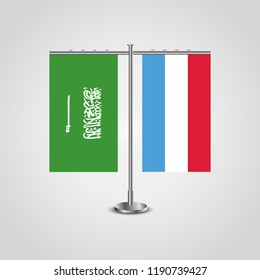 Table stand with flags of Saudi Arabia and Luxembourg.Two flag. Flag pole. Symbolizing the cooperation between the two countries. Table flags