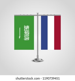 Table stand with flags of Saudi Arabia and Netherlands.Two flag. Flag pole. Symbolizing the cooperation between the two countries. Table flags